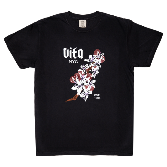 Black shirt front with white lettering 'VITA NYC'  and flowers , no background. 