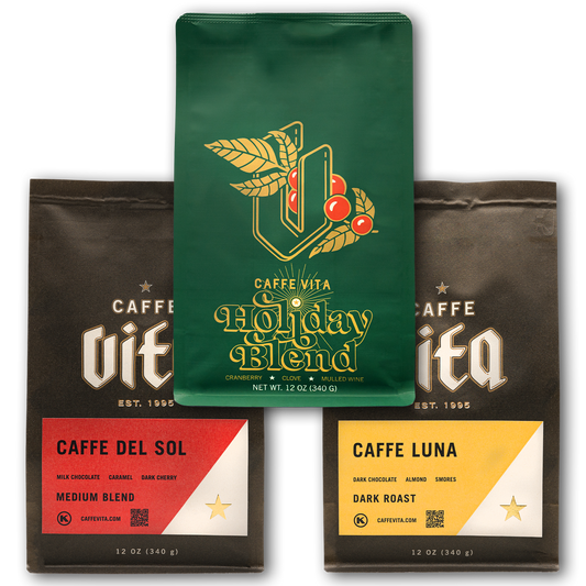 12oz bags of Holiday Blend, Caffe Del Sol, and Caffe Luna. No background. 