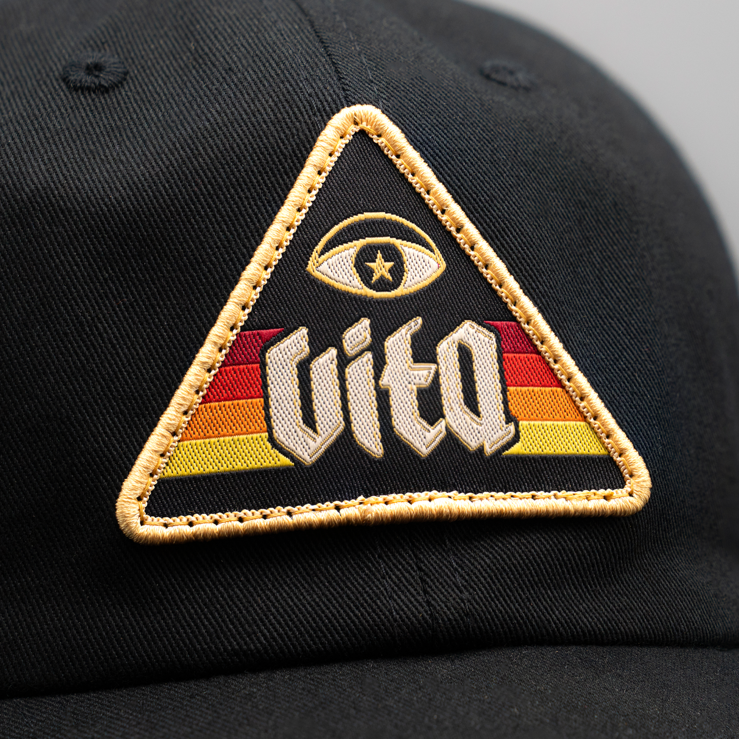 Illuminati hat patch, detailed close up.