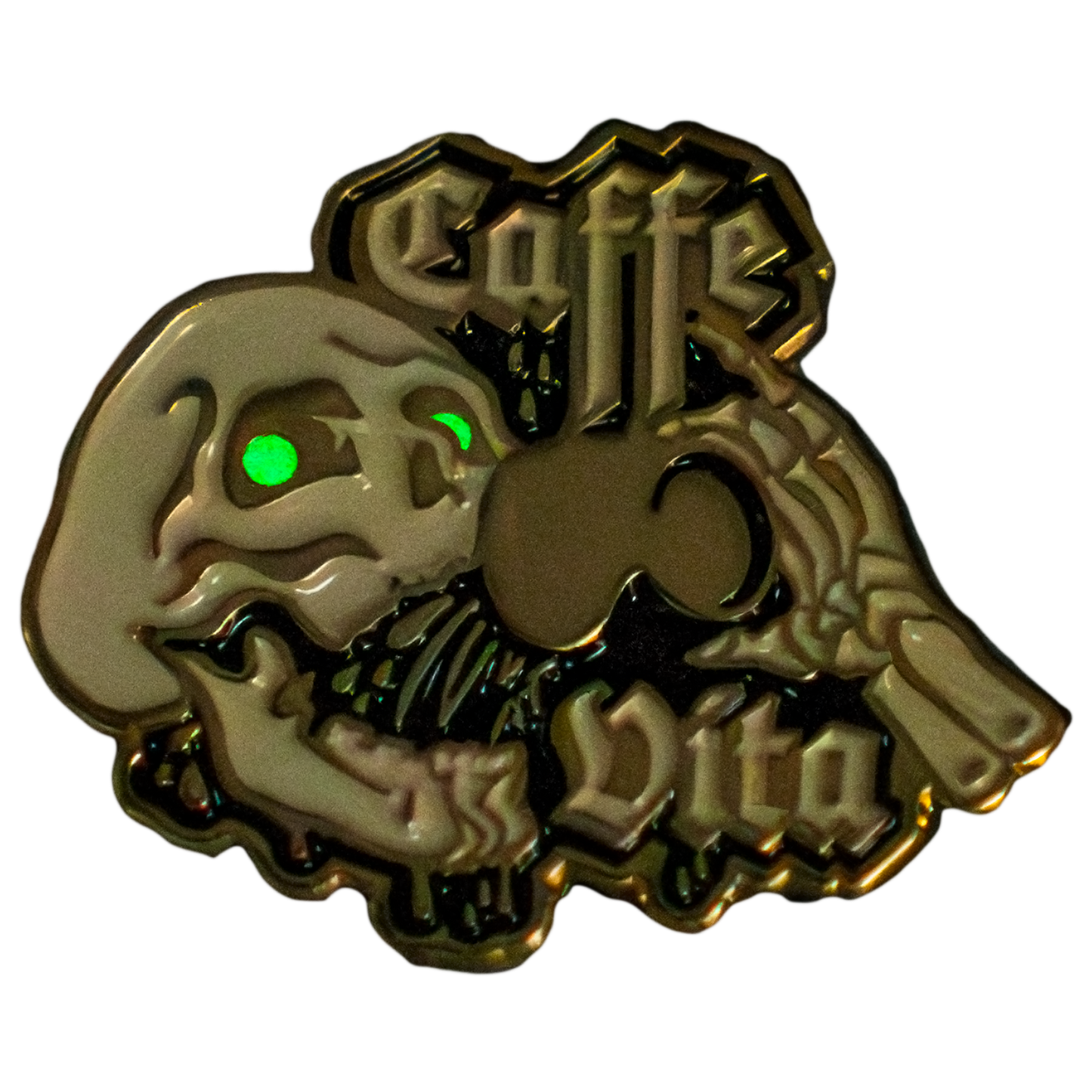 Front, Skull enamel pin with glowing eyes featured. No background. 