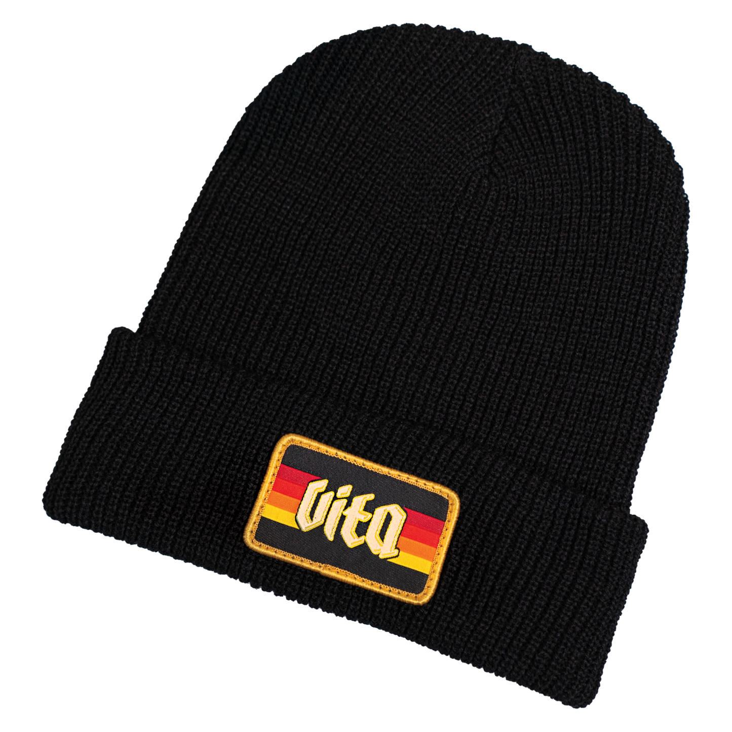 Sunset beanie front with logo patch, no background.