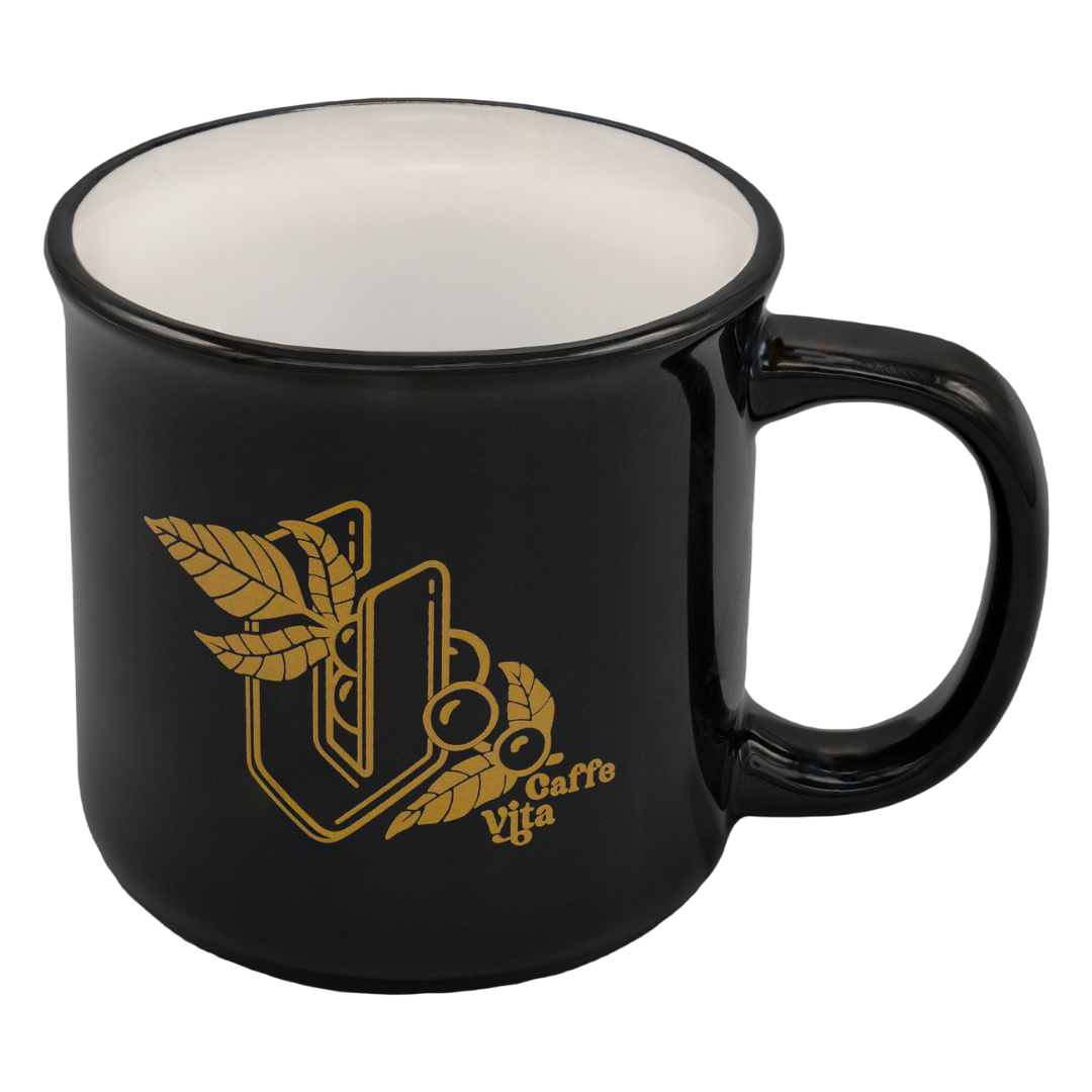 Black mug with gold Vita V, coffee cherries, and Caffe Vita logo, no background